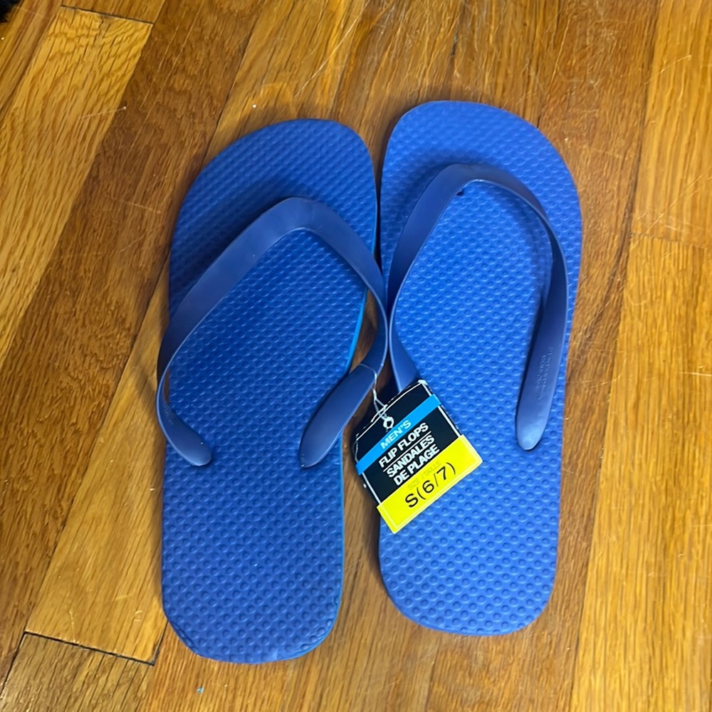 Men’s new blue flip flops size 6/7